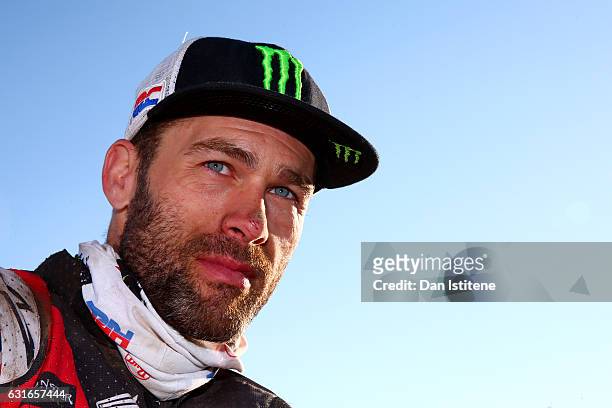 Michael Metge of France and Honda HRC looks on at the finish of stage twelve of the 2017 Dakar Rally on January 14, 2017 in Rio Cuarto, Argentina.