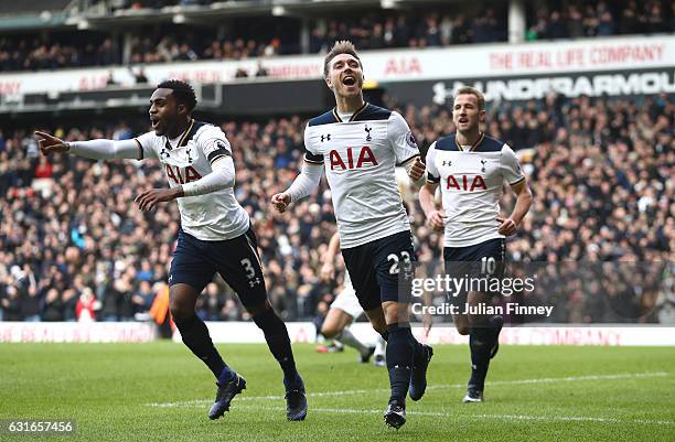 Christian Eriksen of Tottenham Hotspur celebrates his sides second goal after his shot was defelcted in by Gareth McAuley of West Bromwich Albion...