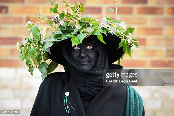 Woman wearing a crown of ivy poses for a photograph before the annual Whittlesea Straw Bear Festival parade on January 14, 2017 in Whittlesey, United...