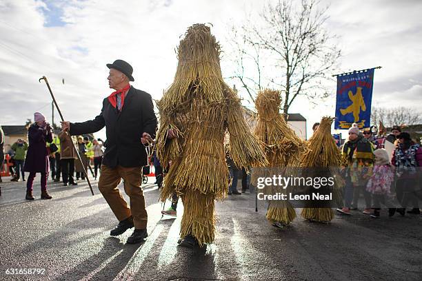 The three Straw Bears are led through the streets during the annual Whittlesea Straw Bear Festival parade on January 14, 2017 in Whittlesey, United...