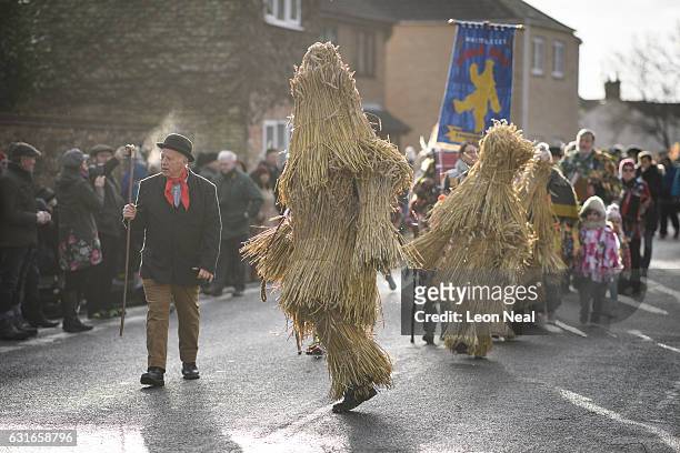 The three Straw Bears are led through the streets during the annual Whittlesea Straw Bear Festival parade on January 14, 2017 in Whittlesey, United...