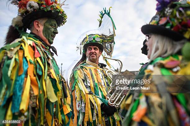 Costumed musicians prepare to take part in the annual Whittlesea Straw Bear Festival parade on January 14, 2017 in Whittlesey, United Kingdom. The...