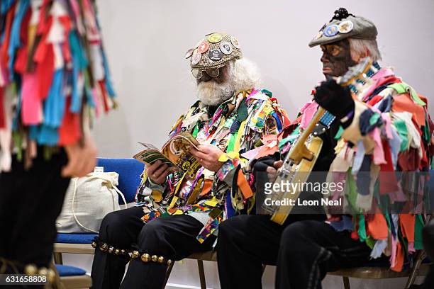 Costumed musicians prepare to take part in the annual Whittlesea Straw Bear Festival parade on January 14, 2017 in Whittlesey, United Kingdom. The...