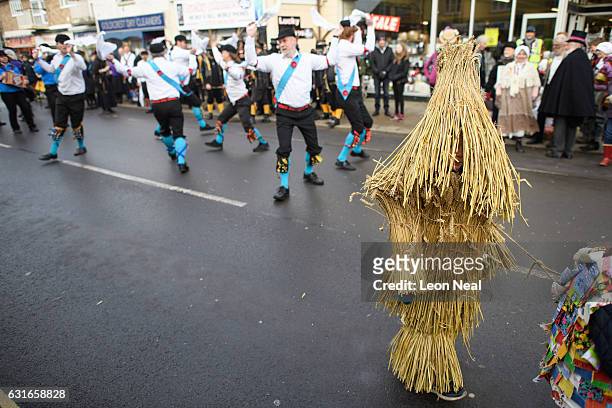 One of the three Straw Bears is led through the streets during the annual Whittlesea Straw Bear Festival parade on January 14, 2017 in Whittlesey,...