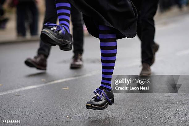 Woman wears traditional wooden clogs during the annual Whittlesea Straw Bear Festival parade on January 14, 2017 in Whittlesey, United Kingdom. The...