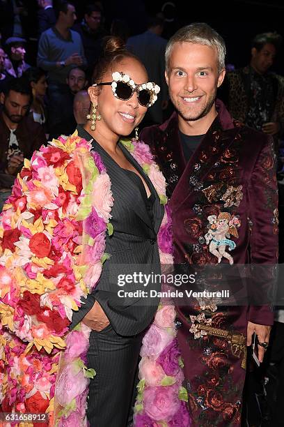 Marjorie Bridges-Woods and Guilherme Siqueira attend the Dolce & Gabbana show during Milan Men's Fashion Week Fall/Winter 2017/18 on January 14, 2017...