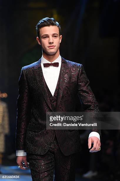 Cameron Dallas walks the runway at the Dolce & Gabbana show during Milan Men's Fashion Week Fall/Winter 2017/18 on January 14, 2017 in Milan, Italy.