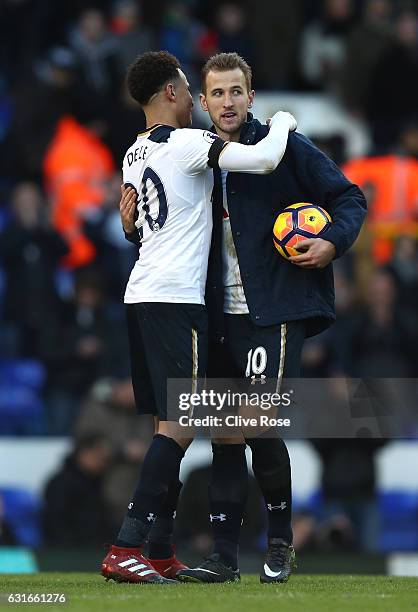 Dele Alli of Tottenham Hotspur and Eric Dier of Tottenham Hotspur embrace after the Premier League match between Tottenham Hotspur and West Bromwich...