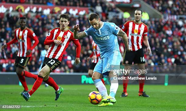 Marko Arnautovic of Stoke City scores his sides second goal during the Premier League match between Sunderland and Stoke City at Stadium of Light on...