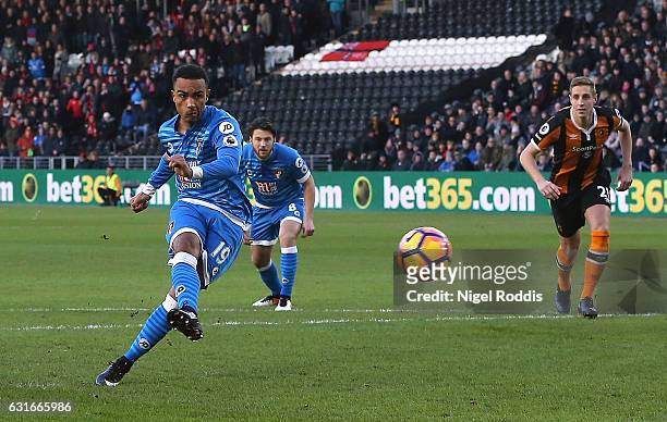 Junior Stanislas of AFC Bournemouth celebrates scoring his sides first goal from the penalty spot during the Premier League match between Hull City...