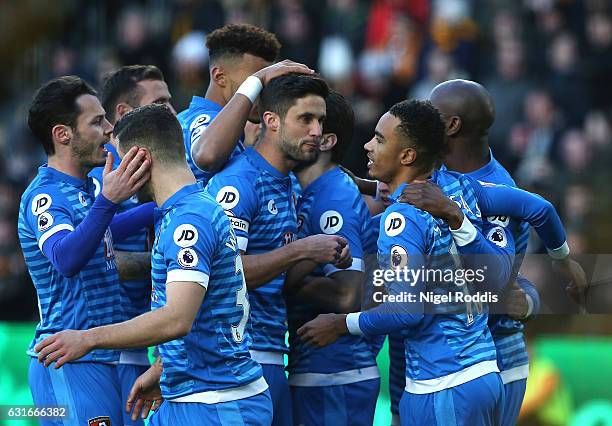 Junior Stanislas of AFC Bournemouth celebrates scoring his sides first goal with his AFC Bournemouth team mates during the Premier League match...