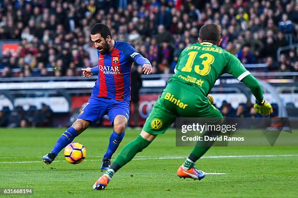 Ardan Turan of FC Barcelona scores his team's fourth goal during the La Liga match between FC Barcelona and UD Las Palmas at Camp Nou stadium on...