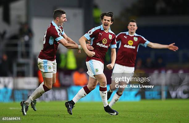 Joey Barton of Burnley celebrates scoring his sides first goal with his Burnley team mates during the Premier League match between Burnley and...