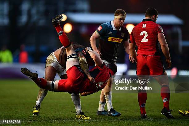 Kyle Sinckler of Harlequins dump tackles Magnus Bradbury of Edinburgh off the ball resulting in a yellow card during the European Rugby Challenge Cup...