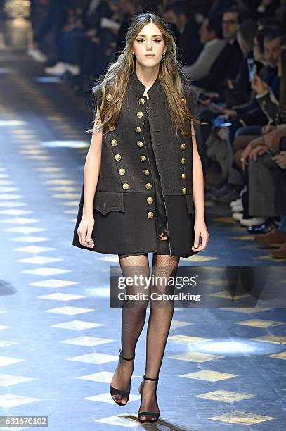 Sistine Stallone walks the runway at the Dolce & Gabbana Autumn Winter 2017 fashion show during Milan Menswear Fashion Week on January 14, 2017 in...