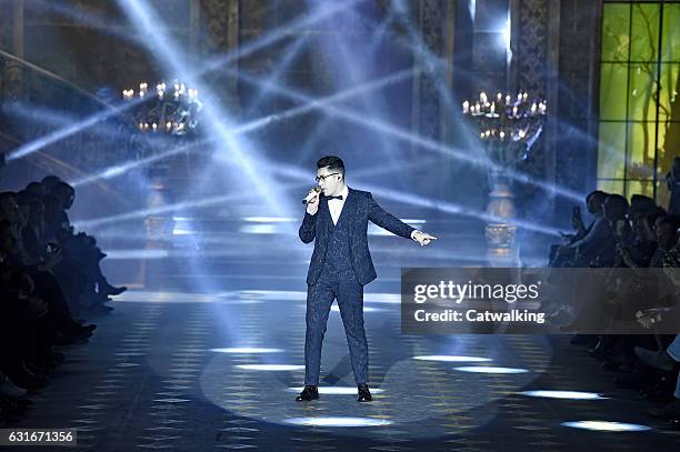 Austin Mahone performs on the runway at the Dolce & Gabbana Autumn Winter 2017 fashion show during Milan Menswear Fashion Week on January 14, 2017 in...