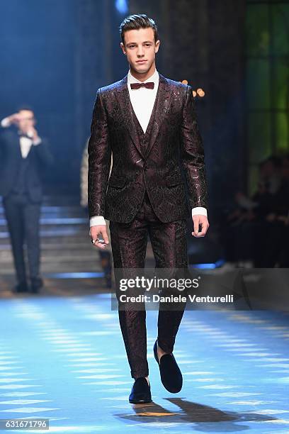 Cameron Dallas walks the runway at the Dolce & Gabbana show during Milan Men's Fashion Week Fall/Winter 2017/18 on January 14, 2017 in Milan, Italy.