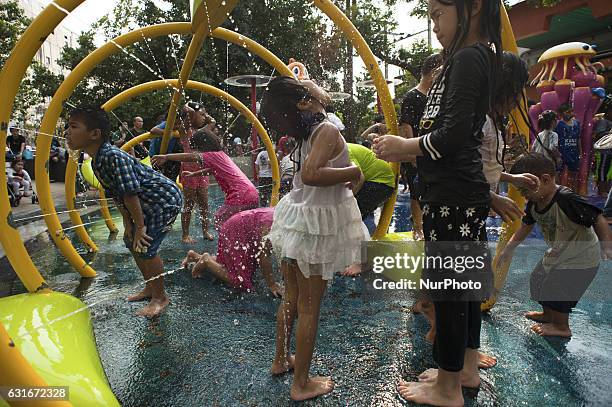 Children play in the water during the National Children's Day event inside children's museum in Bangkok, Thailand, on 14 January 2017.
