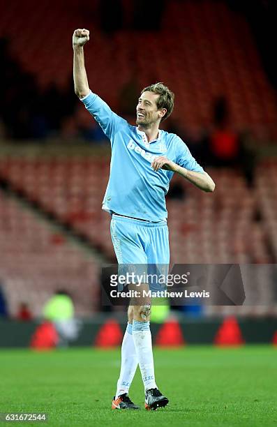 Peter Crouch of Stoke City shows appreciation to the fans after the Premier League match between Sunderland and Stoke City at Stadium of Light on...