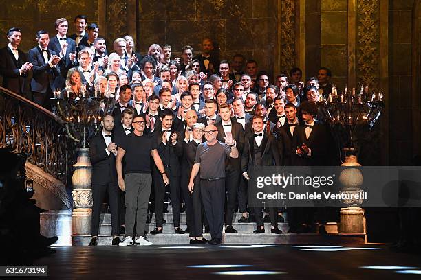 Designers Stefano Gabbana and Domenico Dolce acknowledge the applause of the audience at the Dolce & Gabbana show during Milan Men's Fashion Week...