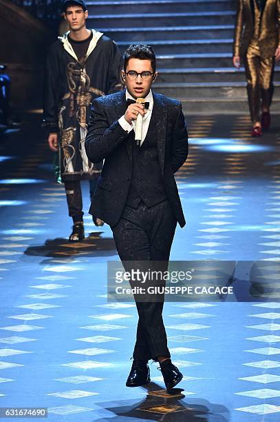 Singer Austin Mahone performs during the show for fashion house Dolce Gabbana during the Men's Fall-Winter 2017-2018 fashion week on January 14, 2017...