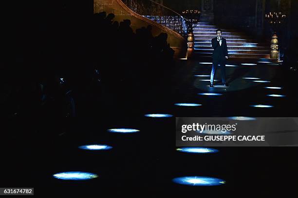 Singer Austin Mahone performs during the show for fashion house Dolce Gabbana during the Men's Fall-Winter 2017-2018 fashion week on January 14, 2017...