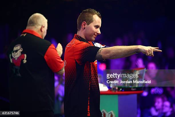 Danny Noppert of the Netherlands celebrates victory in his semi-final match against Darryl Fitton of England on Day Eight of the BDO Lakeside World...