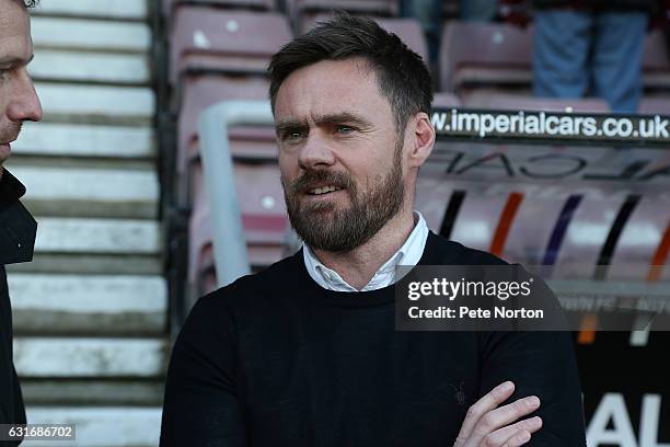 Scuntorpe United manager Graham Alexander looks on prior to the Sky Bet League One match between Northampton Town and Scunthorpe United at Sixfields...
