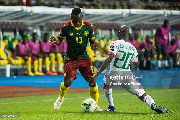 Christian Mougang Bassogog going past Yacouba Coulibaly during second half at African Cup of Nations 2017 between Burkina Faso and Cameroon at Stade...