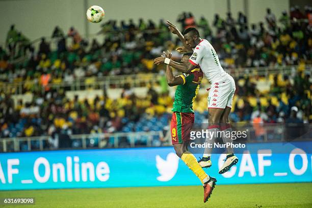 Zoua Daogari Jacques and Bakary Kone fighting about the ball during second half at African Cup of Nations 2017 between Burkina Faso and Cameroon at...