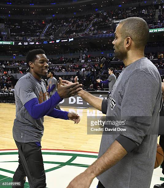 Eric Bledsoe of the Phoenix Suns and Tony Parker of the San Antonio Spurs shake hands before the game as part of NBA Global Games at Arena Ciudad de...