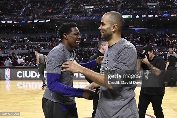Eric Bledsoe of the Phoenix Suns and Tony Parker of the San Antonio Spurs shake hands before the game as part of NBA Global Games at Arena Ciudad de...
