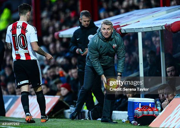 Brentford Football Club Manager Dean Smith looks to throw the ball during the Championship Match between Brentford and Newcastle United at Griffin...