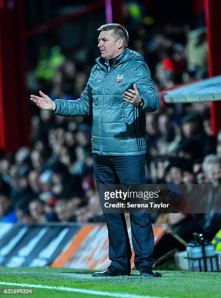 Brentford Football Club Manager Dean Smith gestures from the sidelines during the Championship Match between Brentford and Newcastle United at...