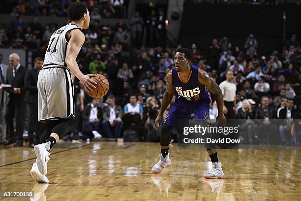 Eric Bledsoe of the Phoenix Suns plays defense against Bryn Forbes of the San Antonio Spurs as part of NBA Global Games at Arena Ciudad de Mexico on...