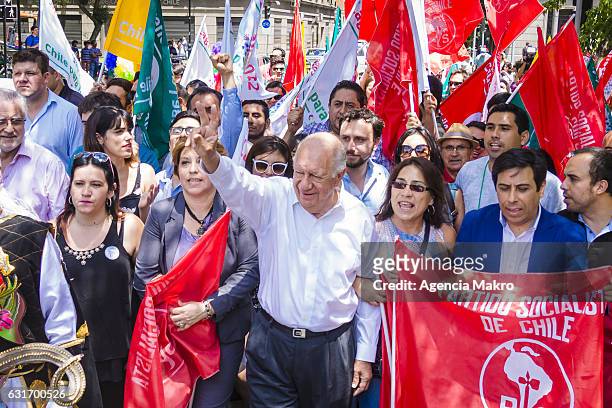 Former Chilean President Ricardo Lagos arrives accompanied by supporters of the Party for Democracy Council before making the proclamation as party...