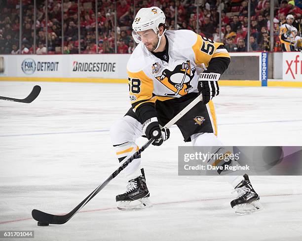 Kris Letang of the Pittsburgh Penguins skates with the puck during an NHL game against the Detroit Red Wings at Joe Louis Arena on January 14, 2017...