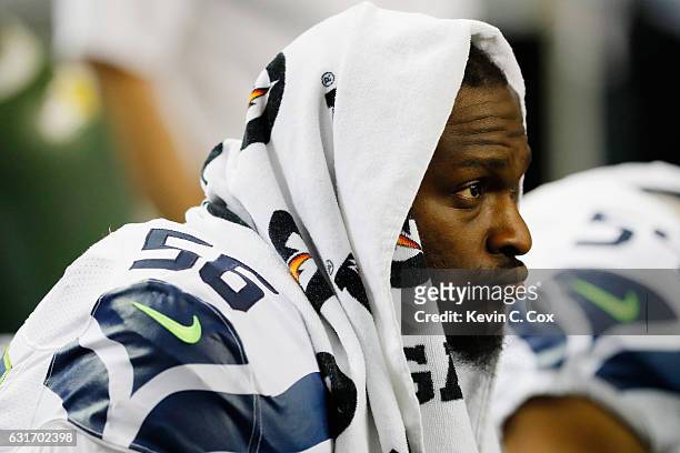 Cliff Avril of the Seattle Seahawks looks on during the game against the Atlanta Falcons at the Georgia Dome on January 14, 2017 in Atlanta, Georgia.