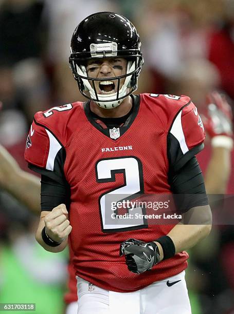 Matt Ryan of the Atlanta Falcons celebrates after scoring a touchdown against the Seattle Seahawks at the Georgia Dome on January 14, 2017 in...