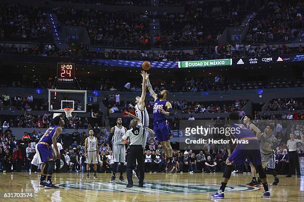 Pau Gasol of San Antonio Spurs jumps for the ball with Tyson Chandler of Phoenix Suns during the match between San Antonio Spurs and Phoenix Suns at...