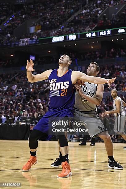 Alex Len of the Phoenix Suns bpxes out David Lee of the San Antonio Spurs as part of NBA Global Games at Arena Ciudad de Mexico on January 14, 2017...