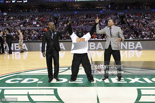 Former NBA players, Gary Payton and Shawn Marion wave to crowd during the San Antonio Spurs game against the Phoenix Suns as part of NBA Global Games...
