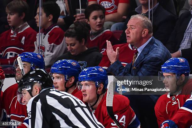 Head coach of the Montreal Canadiens Michel Therrien calls for the referee during the NHL game against the New York Rangers at the Bell Centre on...