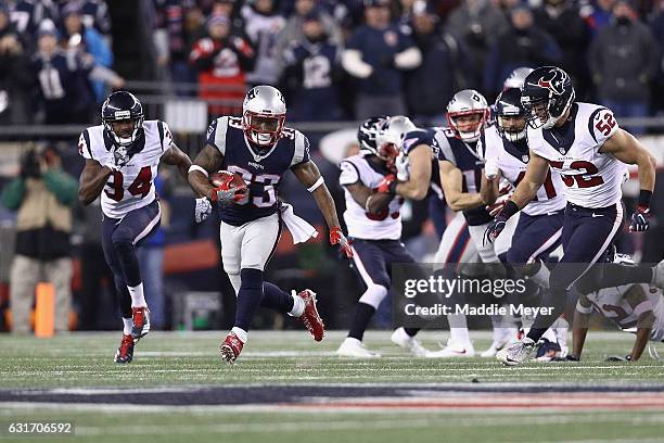 Dion Lewis of the New England Patriot runs the ball for a 98-yard kick off return touchdown against the Houston Texans during the AFC Divisional...