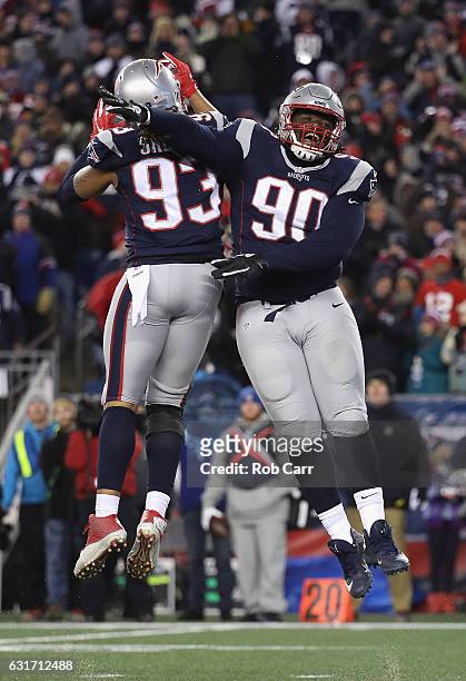 Jabaal Sheard and Malcom Brown of the New England Patriots reacts in the second half against the Houston Texans during the AFC Divisional Playoff...