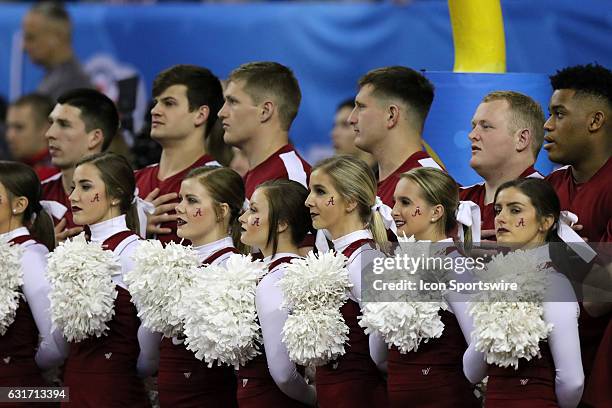 Alabama Crimson Tide cheerleaders at the College Football Playoff Semifinal at the Chick-fil-A Peach Bowl between the Washington Huskies and the...