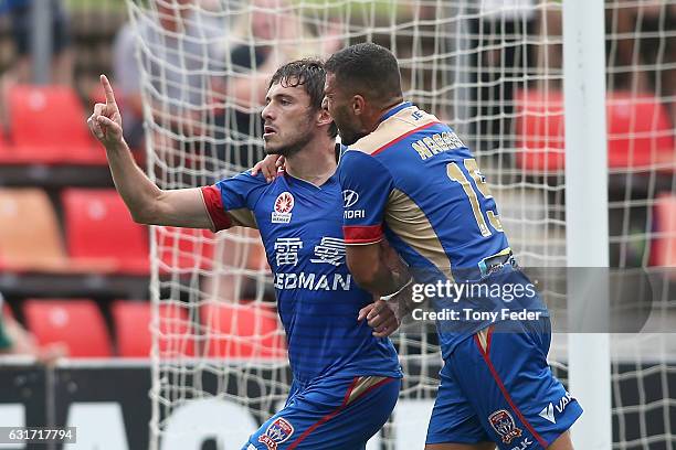 Mateo Poljak of the Jets celebrates a goal with team mate Andrew Nabbout during the round 15 A-League match between the Newcastle Jets and the Perth...