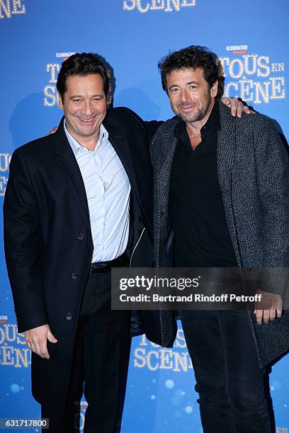 French voices of the movie, imitator Laurent Gerra and singer Patrick Bruel attend the "Tous en Scene" Paris Premiere at Le Grand Rex on January 14,...