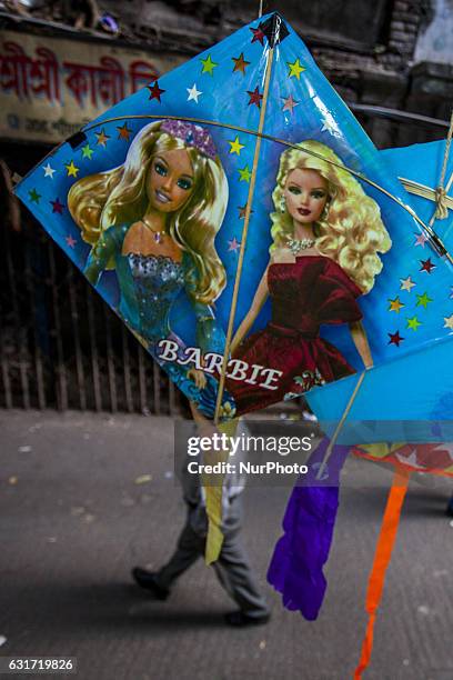 People take part at Shakrain festival in Dhaka on January 14, 2016.Shakrain is known as the kite festival in Bangladesh. Especially southern part of...