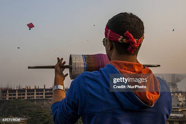 People take part at Shakrain festival in Dhaka on January 14, 2016.Shakrain is known as the kite festival in Bangladesh. Especially southern part of...